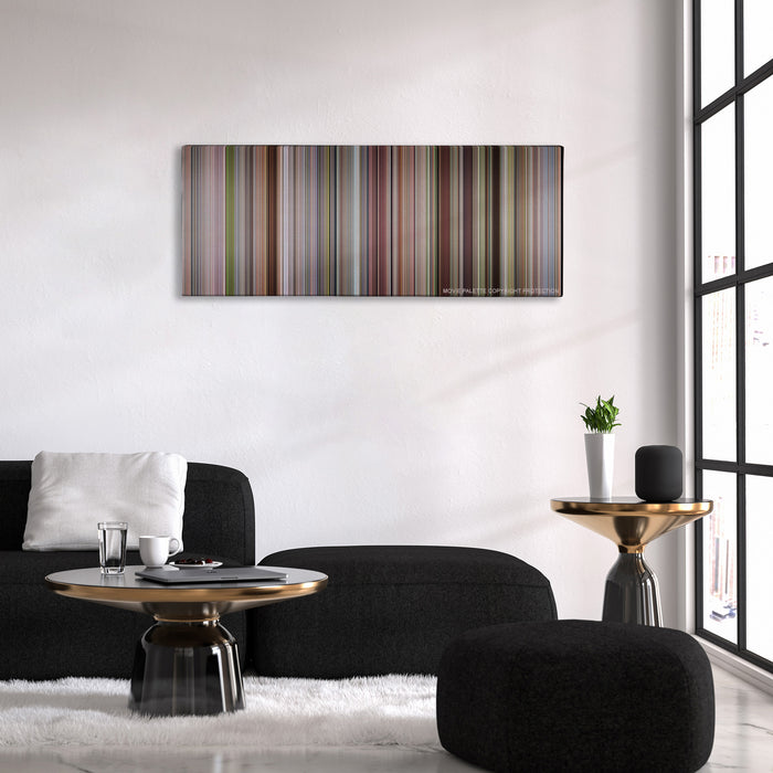 A Simple Favor color palette canvas above a black sofa with a gold-topped table