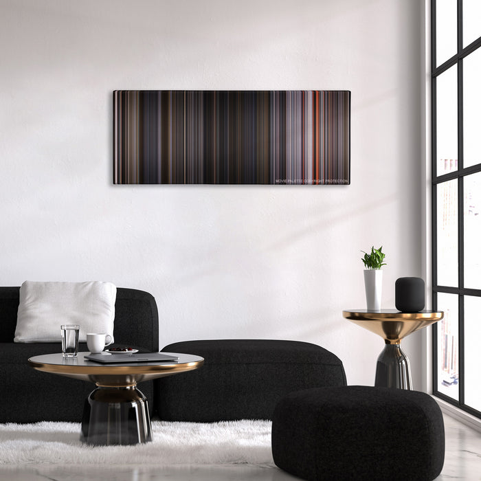 Ant-Man and the Wasp color palette canvas above a black sofa with a gold-topped table