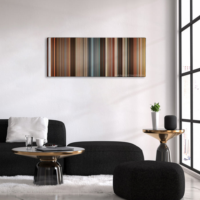 Juno color palette canvas above a black sofa with a gold-topped table