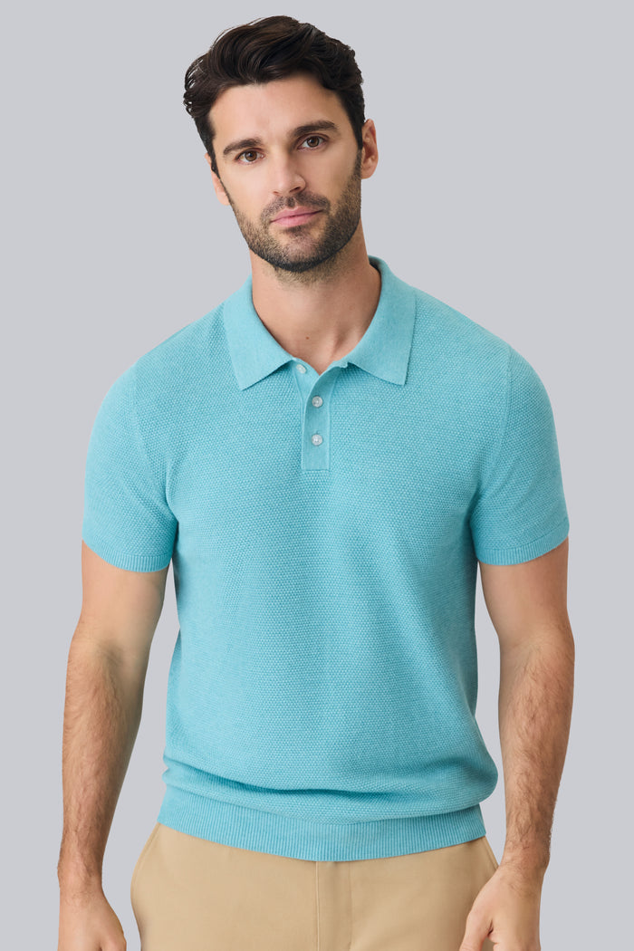Front view of a man wearing Tech Line Sweater Polo in Shallow Water Heather