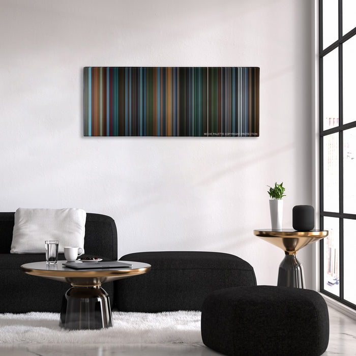 X2: X-Men United color palette canvas above a black sofa with a gold-topped table