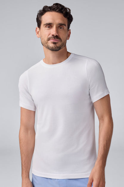 Front view of a man wearing 18-Hour Jersey Crew Neck Undershirt in Bright White