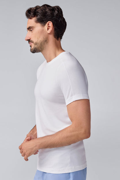 Side view of a man wearing 18-Hour Jersey Crew Neck Undershirt in Bright White
