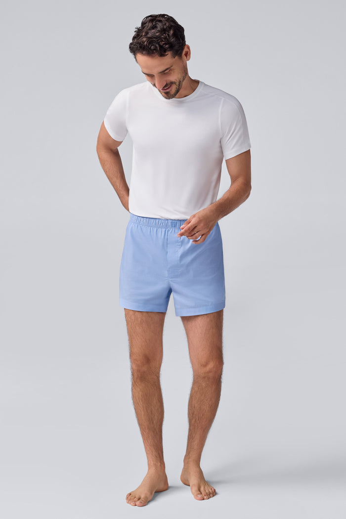 Full front view of a man wearing 18-Hour Jersey Crew Neck Undershirt in Bright White