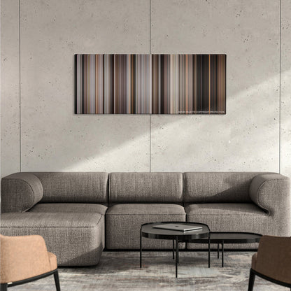 A Bronx Tale color palette canvas on a concrete wall above a gray sectional sofa
