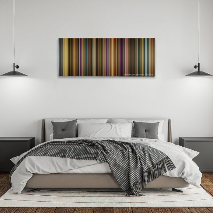 Across the Universe color palette canvas above a bed, between two black pendant lamps