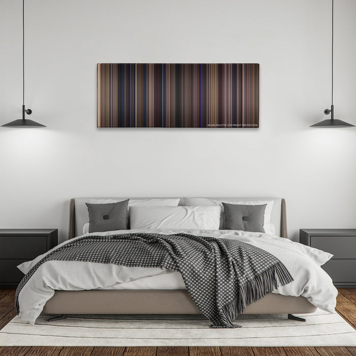 Almost Famous color palette canvas above a bed, between two black pendant lamps