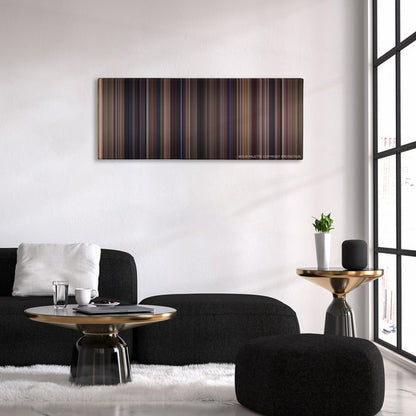 Almost Famous color palette canvas above a black sofa with a gold-topped table
