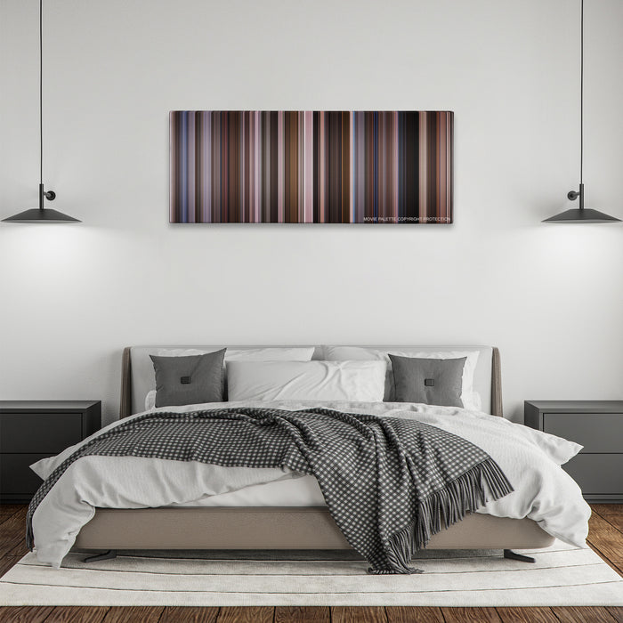 An Education color palette canvas above a bed, between two black pendant lamps