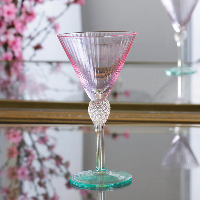 Beatriz Ball Glass Aquarelle Martini — Single glass on a mirrored surface beside other glassware