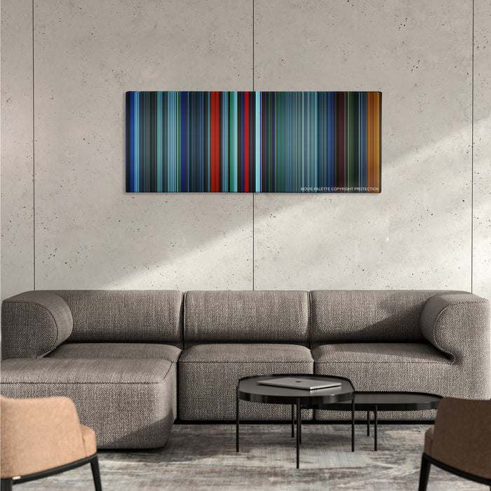 Atomic Blonde color palette canvas on a concrete wall above a gray sectional sofa