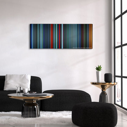 Atomic Blonde color palette canvas above a black sofa with a gold-topped table