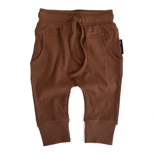 Brown baby pants with drawstring on a white background