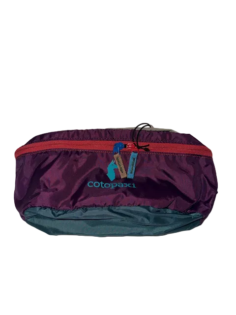 Cotopaxi Bataan 3L Fanny Pack Del Día #1 with purple body, red zipper and blue base