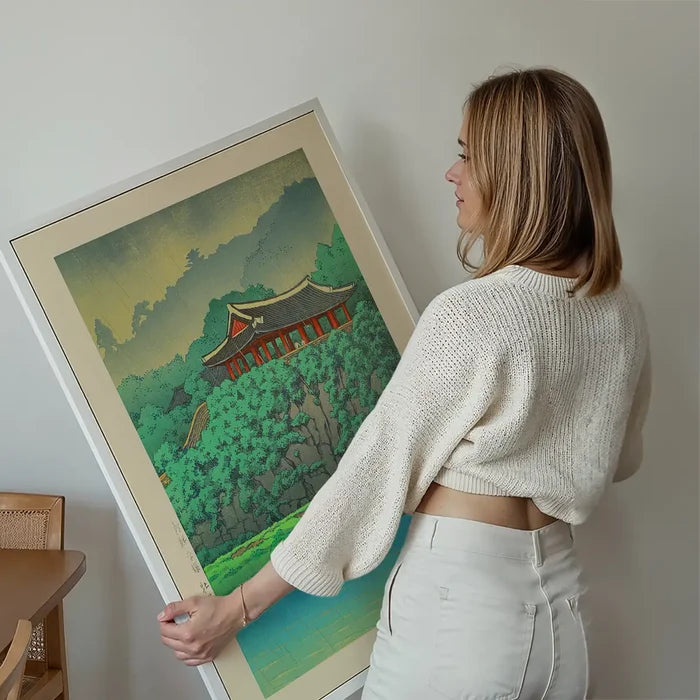 Botan Dai at Ping-yang, Korea Print by Hasui Kawase held up against a living room wall