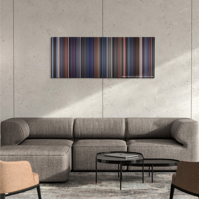Brazil color palette canvas on a concrete wall above a gray sectional sofa