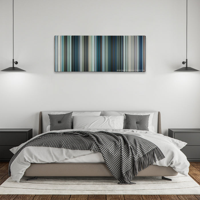 Chappie color palette canvas above a bed, between two black pendant lamps