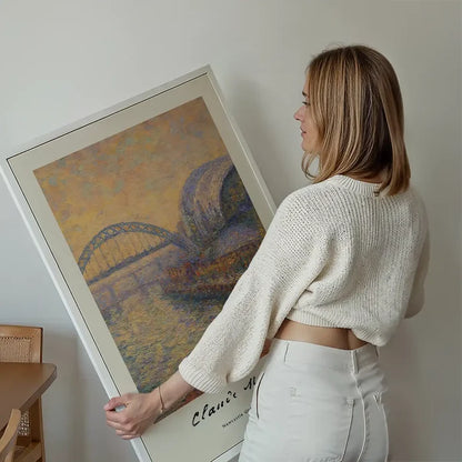 Claude Monet's Painting of Newcastle Quayside Print held up against a living room wall