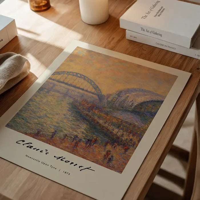 Claude Monet's Painting of Newcastle Quayside Print unframed on a home office desk