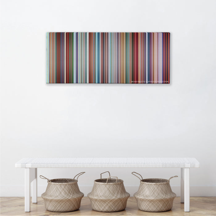 Despicable Me color palette canvas above a white bench with three woven baskets
