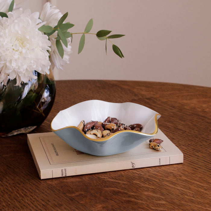 Beatriz Ball Encanto Carola Small Round Bowl Slate and White — With nuts beside flowers and books