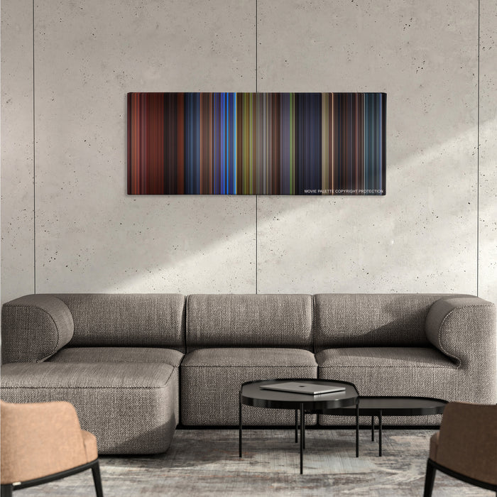 Final Destination 3 color palette canvas on a concrete wall above a gray sectional sofa