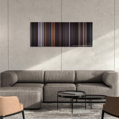 Friday the 13th Part VIII: Jason Takes Manhattan color palette canvas on a concrete wall above a gray sectional sofa