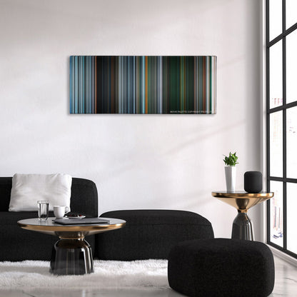 Gravity color palette canvas above a black sofa with a gold-topped table