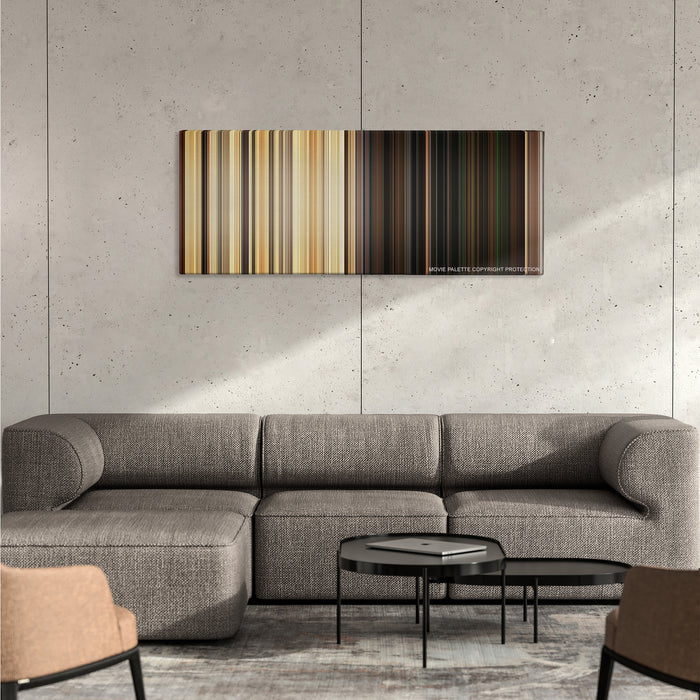 Green Zone color palette canvas on a concrete wall above a gray sectional sofa