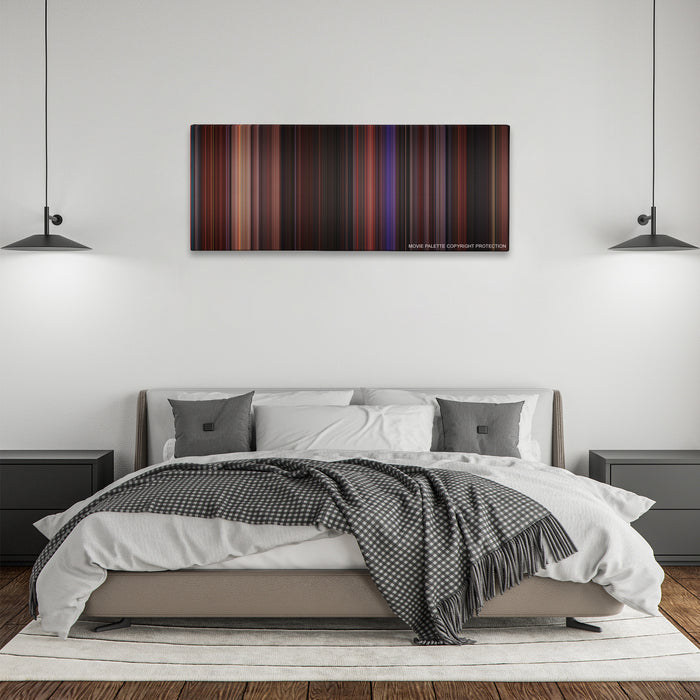 Hocus Pocus color palette canvas above a bed, between two black pendant lamps