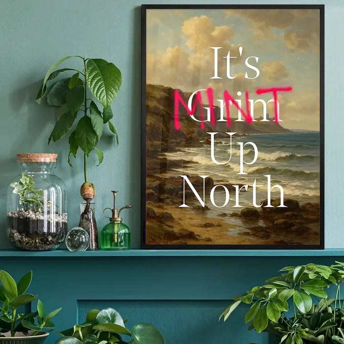 It's Mint Up North Typography Poster, quote print black framed on a living room shelf