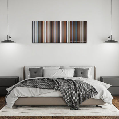 Joy color palette canvas above a bed, between two black pendant lamps