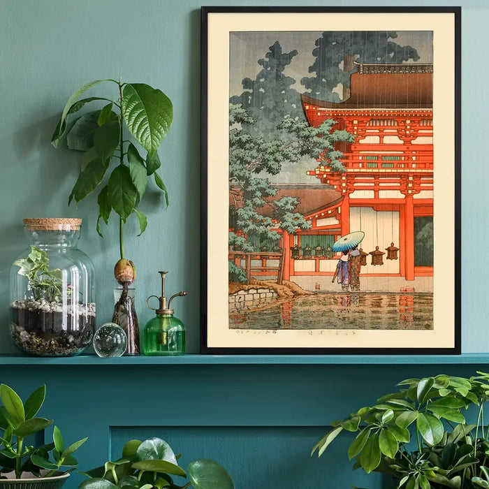 Kasuga Shrine in Nara Print by Hasui Kawase, Japanese woodblock print black framed on a living room shelf