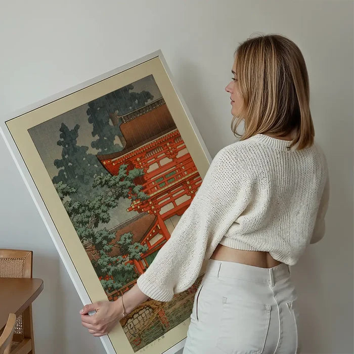 Kasuga Shrine in Nara Print by Hasui Kawase held up against a living room wall