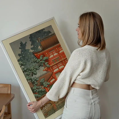 Kasuga Shrine in Nara Print by Hasui Kawase held up against a living room wall