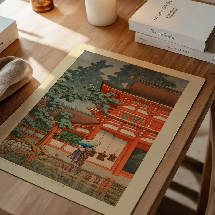 Kasuga Shrine in Nara Print by Hasui Kawase, Japanese woodblock print unframed on a home office desk