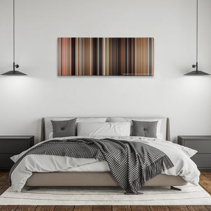 Knight and Day color palette canvas above a bed, between two black pendant lamps