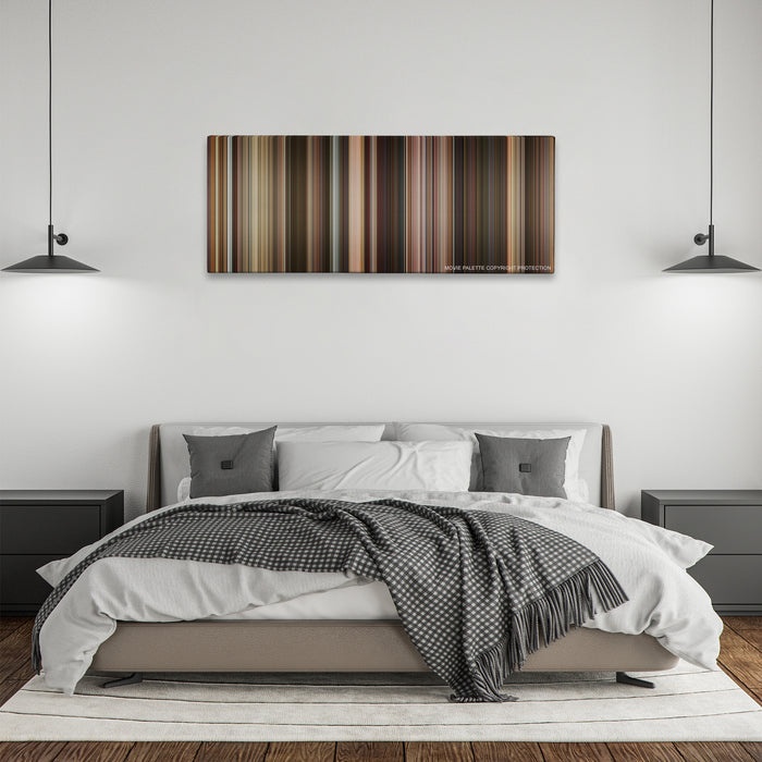 Last Vegas color palette canvas above a bed, between two black pendant lamps