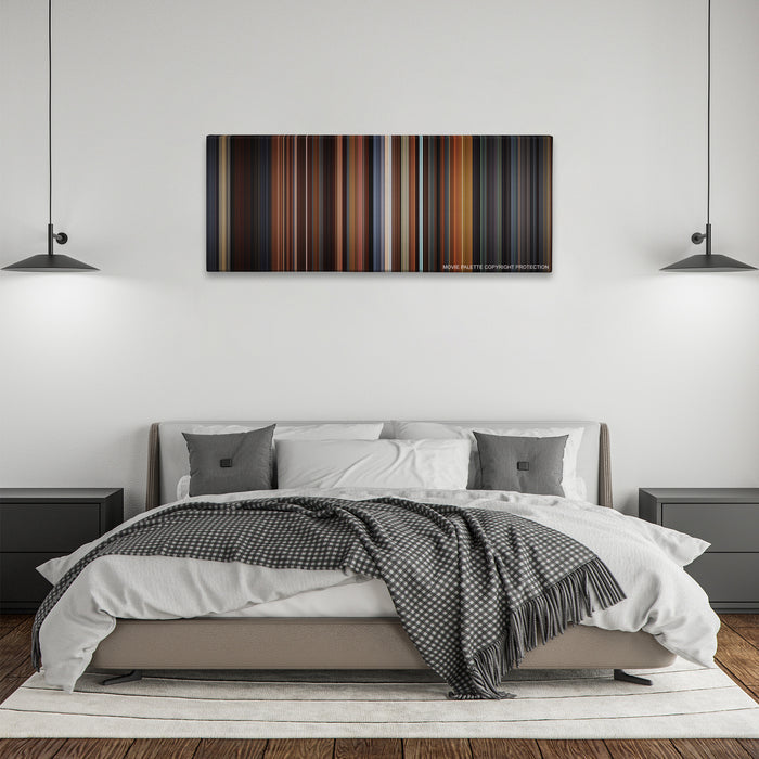Little Women color palette canvas above a bed, between two black pendant lamps