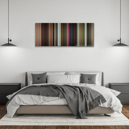 Madagascar color palette canvas above a bed, between two black pendant lamps