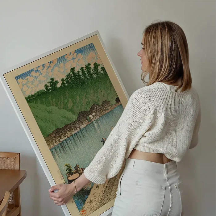 Mihogaseki Beach, Izumo Province Print by Hasui Kawase held up against a living room wall