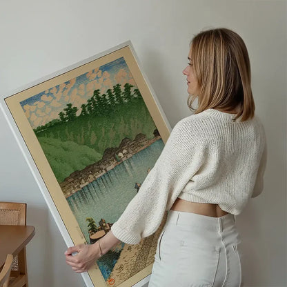 Mihogaseki Beach, Izumo Province Print by Hasui Kawase held up against a living room wall