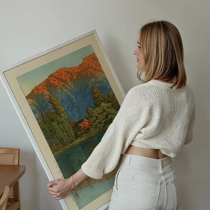 Morning at Ao Marsh, Ura Heights Print by Hasui Kawase held up against a living room wall