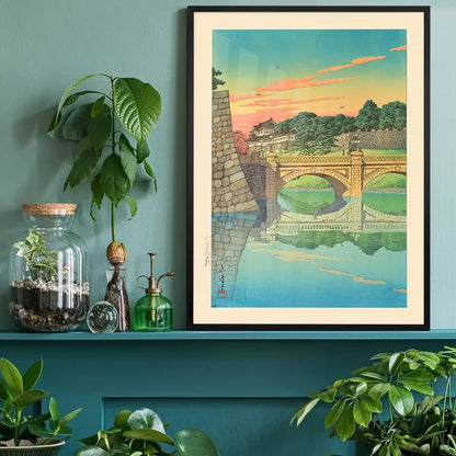 Morning at Niju Bridge Print by Hasui Kawase, Japanese woodblock print black framed on a living room shelf