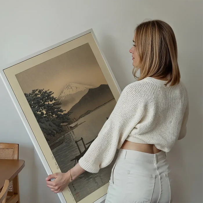 Nagahama Beach in Mito Print by Hasui Kawase held up against a living room wall