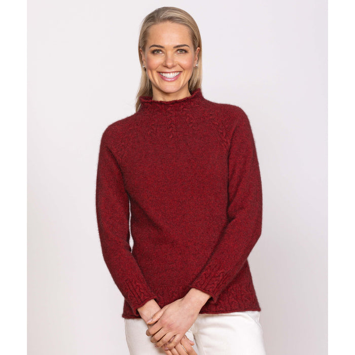 Woman wearing Noble Wilde - Merino & Possum Cable Funnel Neck (NW3221) in the colour Sangria