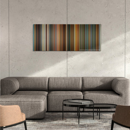 Ocean's Eleven color palette canvas on a concrete wall above a gray sectional sofa
