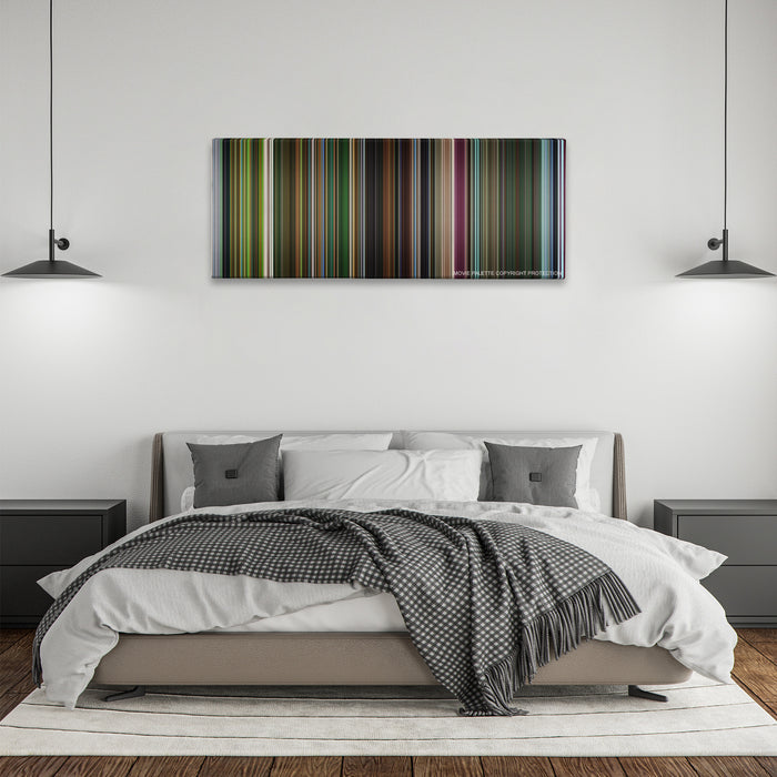 Oldboy color palette canvas above a bed, between two black pendant lamps