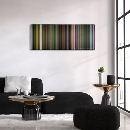 Oldboy color palette canvas above a black sofa with a gold-topped table