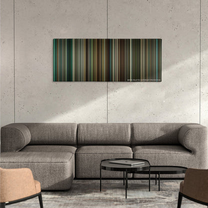 Remember Me color palette canvas on a concrete wall above a gray sectional sofa